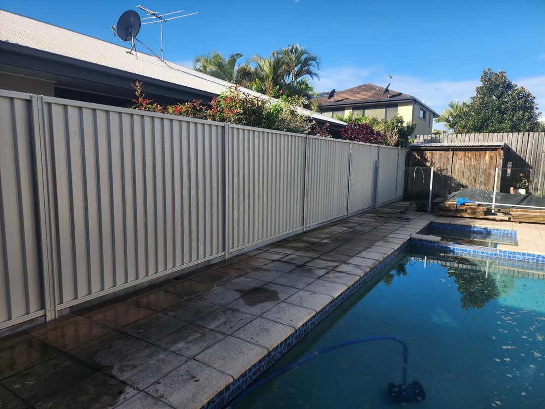 Custom black Colorbond fence built by Fence Me